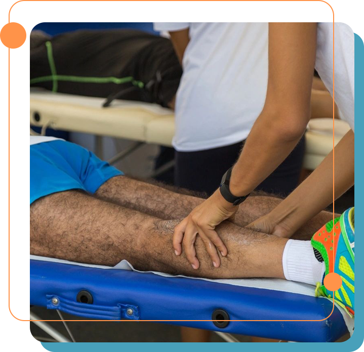 A person is getting his leg examined by an athlete.