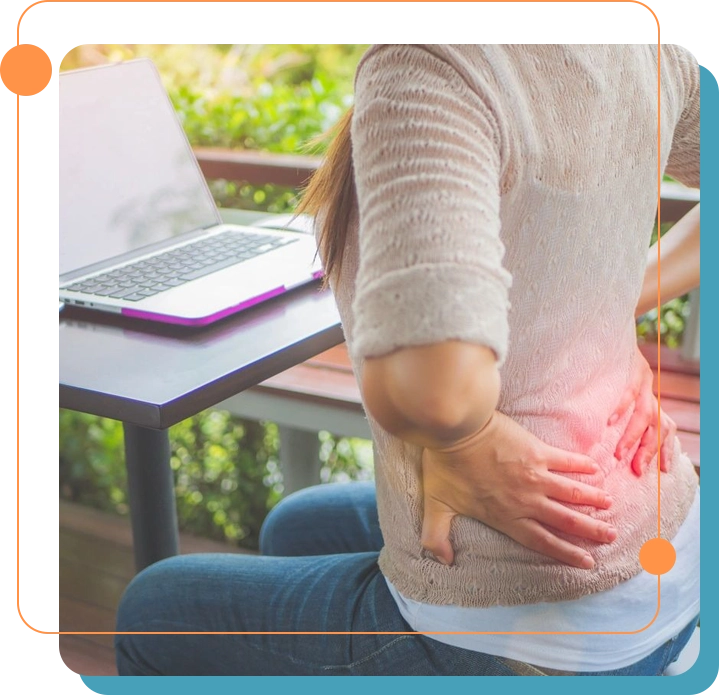 A person sitting down with their hands on the back of their legs.