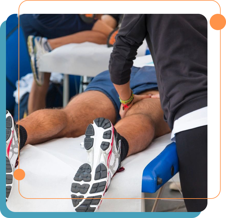 A person is getting his leg examined by an athlete.