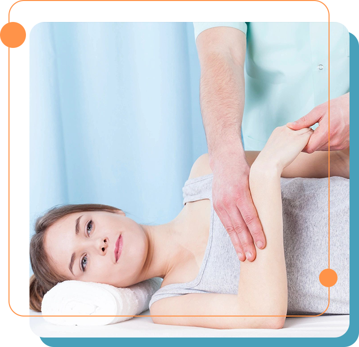 A woman getting her arm worked on the table